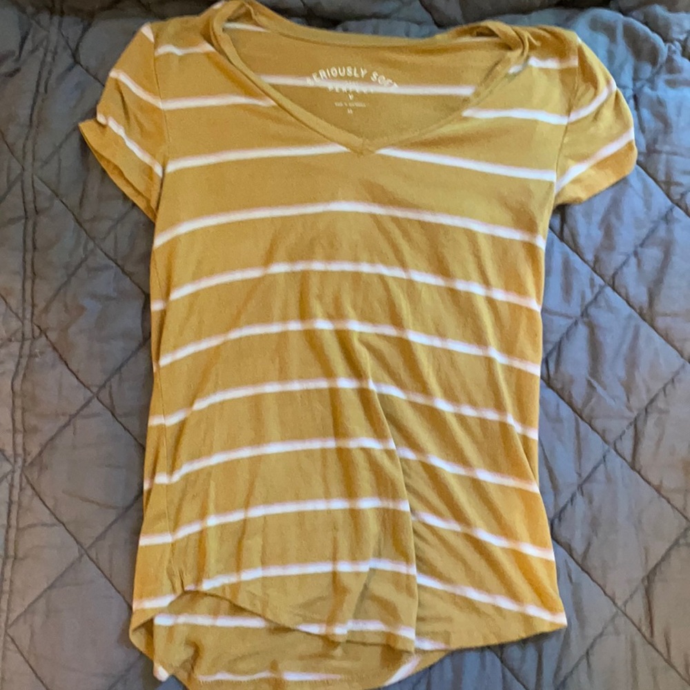 Yellow or gold, pink and white striped shirt